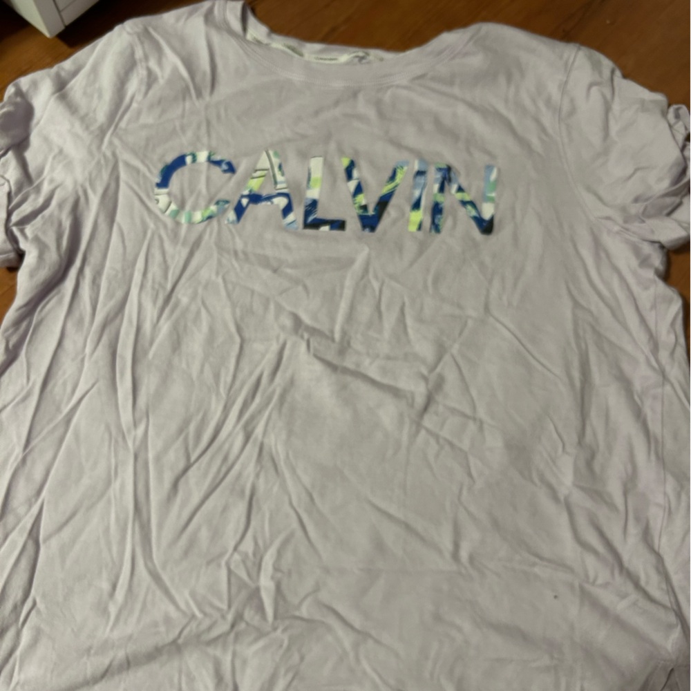 Calvin Klein shirt no stains a Patel color. It just too big on me. Wore once